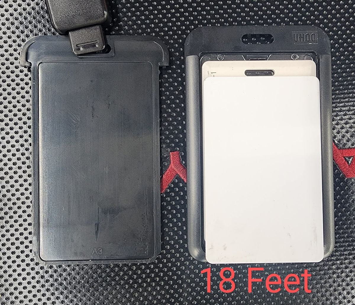 Passive RFID card positioned behind an employee badge holder