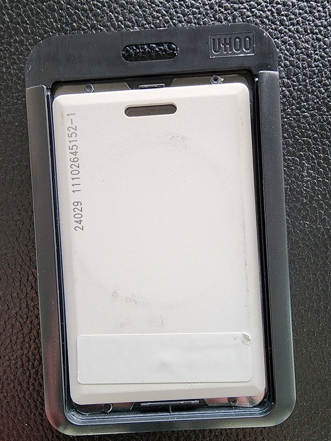 Passive RFID sticker tag applied to an employee badge